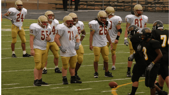 AZMM Blog Graphic on college athlete influencers College football players on field.